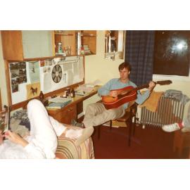 Wright College students in a dormitory room with a guitar, Epsilon Block