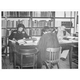 UNE students studying in a Library
