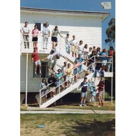 Delta Block student group standing on stairs, Wright College