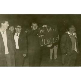 Wright College students holding a “We Want Jungle!” sign, 1964