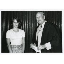 Miss Annette Mehaffey receiving an award from Mr Jim Pollard