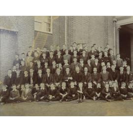 Group of pupils and staff outside the Armidale School