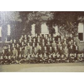 Group of pupils and staff outside the Armidale School
