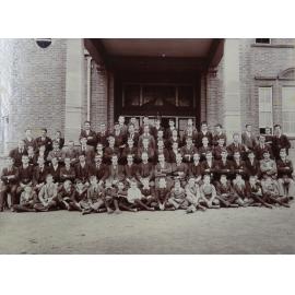 Group of pupils and staff outside the Armidale School