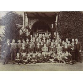 Group of pupils and staff outside the Armidale School