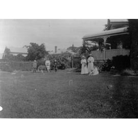 Photo of a group playing croquet