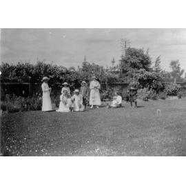 Photo of a group playing croquet