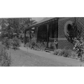 Photo of unidentified house and garden