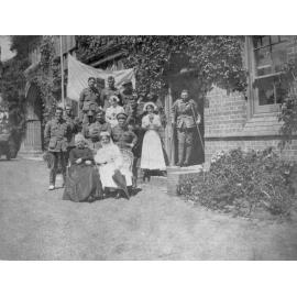 Sarah White with a group of soldiers and Voluntary Aid Detachment [VAD] staff outside Booloominbah