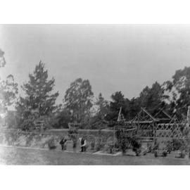 Men working in the gardens at Booloominbah