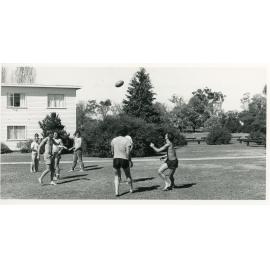 Wright College residents playing touch football, 1981