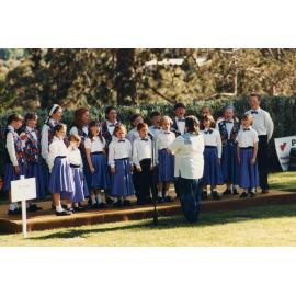 A choir performing at the UNE Celebration of Giving, 1995
