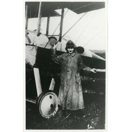 Woman standing in front of an aircraft