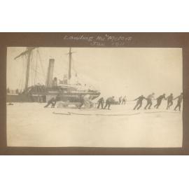 Landing the Motors 11, showing the Terra Nova moored by the ice shelf