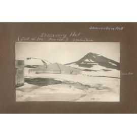 Discovery hut with Observation Hill behind, 1911