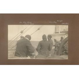 Priestley, Wright and Dimitri on the poop deck of the Terra Nova