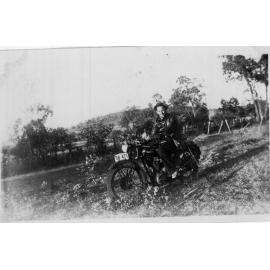 Laurie Hattersley on Triumph motorbike used to collect orders for Hanna's grocery department, c. 1935