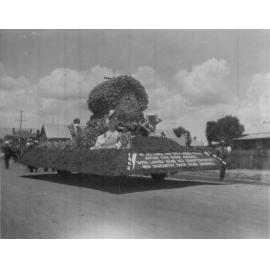 75th Procession 'Nature' float and three women, 1938