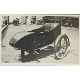 Motorbike sidecar parked in street [Sydney?]