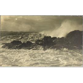 Waves crashing on rocks