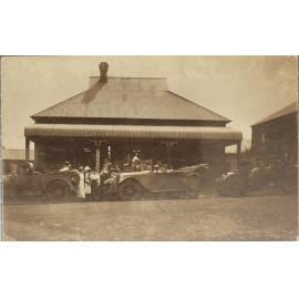 Car and group outside shop, [Dorrigo?]