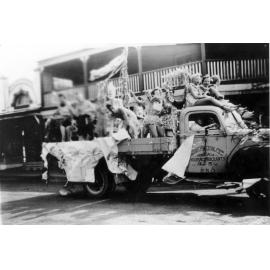Armidale Teachers' College participants in 1954-1955 Easter Parade on corner of Marsh and Beardy Streets