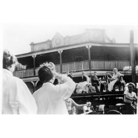 Armidale Teachers' College participants in 1954-1955 Easter Parade on corner of Marsh and Beardy Streets