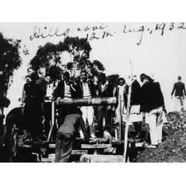 Armidale Teachers' College students inspecting shaft and windlass at Hillgrove