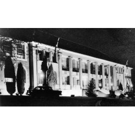 Armidale Teachers' College, building illuminated for celebration of UNE's autonomy, 1955