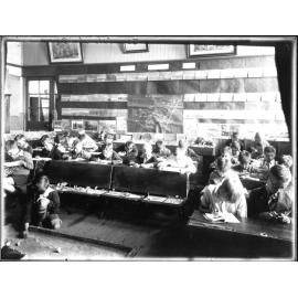 Armidale: Schools: Fifth class at Armidale Demonstration School at work, 1940. 2 copies.