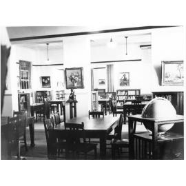 Armidale Teachers' College: Part of the College Library showing some of the paintings, world globe and statue