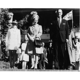 Queen Elizabeth, Prince Philip and Princess Anne stand in front of the College while attending a civic reception, 28 April 1970. 