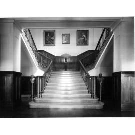 The main stairway showing the terrazzo steps and the maple dadoes