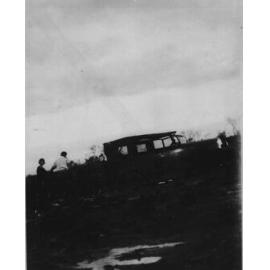 Motor car bogged on the black soil plains of Beemery Station, Brewarrina, c. 1930