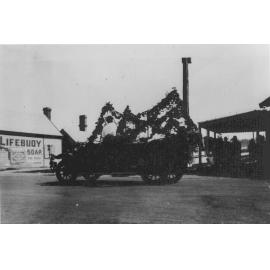 Tourer car decorated for a procession, c. 1925