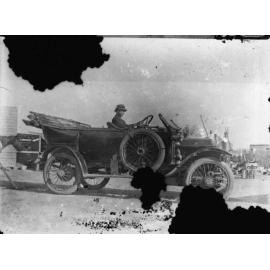 [Thomas Bruce] in mail car, Hillgrove, NSW, c.1920