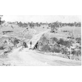 Constable Dobie of Hillgrove on horseback on bridge near Chinaman's Gully Road, c. 1905