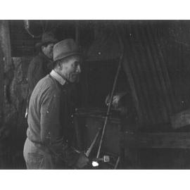 Jock Usher (front) and Bill Faint sharpening drills, Damifino Mine, c. 1948