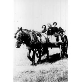 Horsedrawn cart and students NEUC, 1941