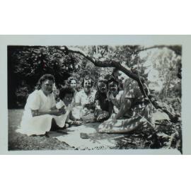 Students on the lawn under a tree NEUC, November 1942