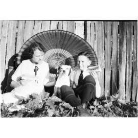 Clare Chamberlain and Ray Jopson with a dog,1920-1922