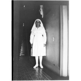 May Chamberlain in the entrance hallway of 63 Barney Street, Armidale