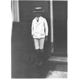 Ray Jopson standing by the front entrance of 63 Barney Street, Armidale