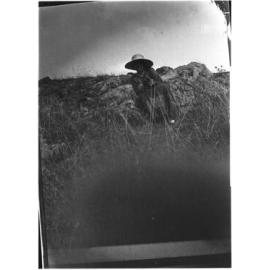 Unidentified woman in a rural setting