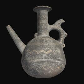 MA1978.63.1 Black Slip II Ware spouted juglet
