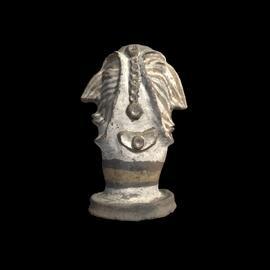MA1988.42.1 Pottery figure for house ridge pole