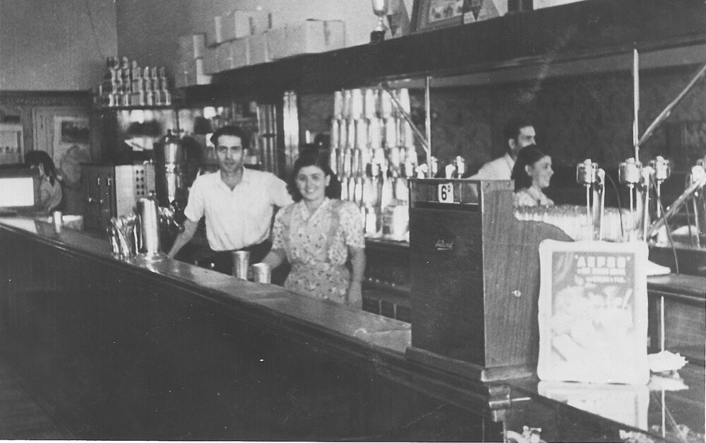 George Dedes and his sister, Katina, in the café in Moree, about 1947